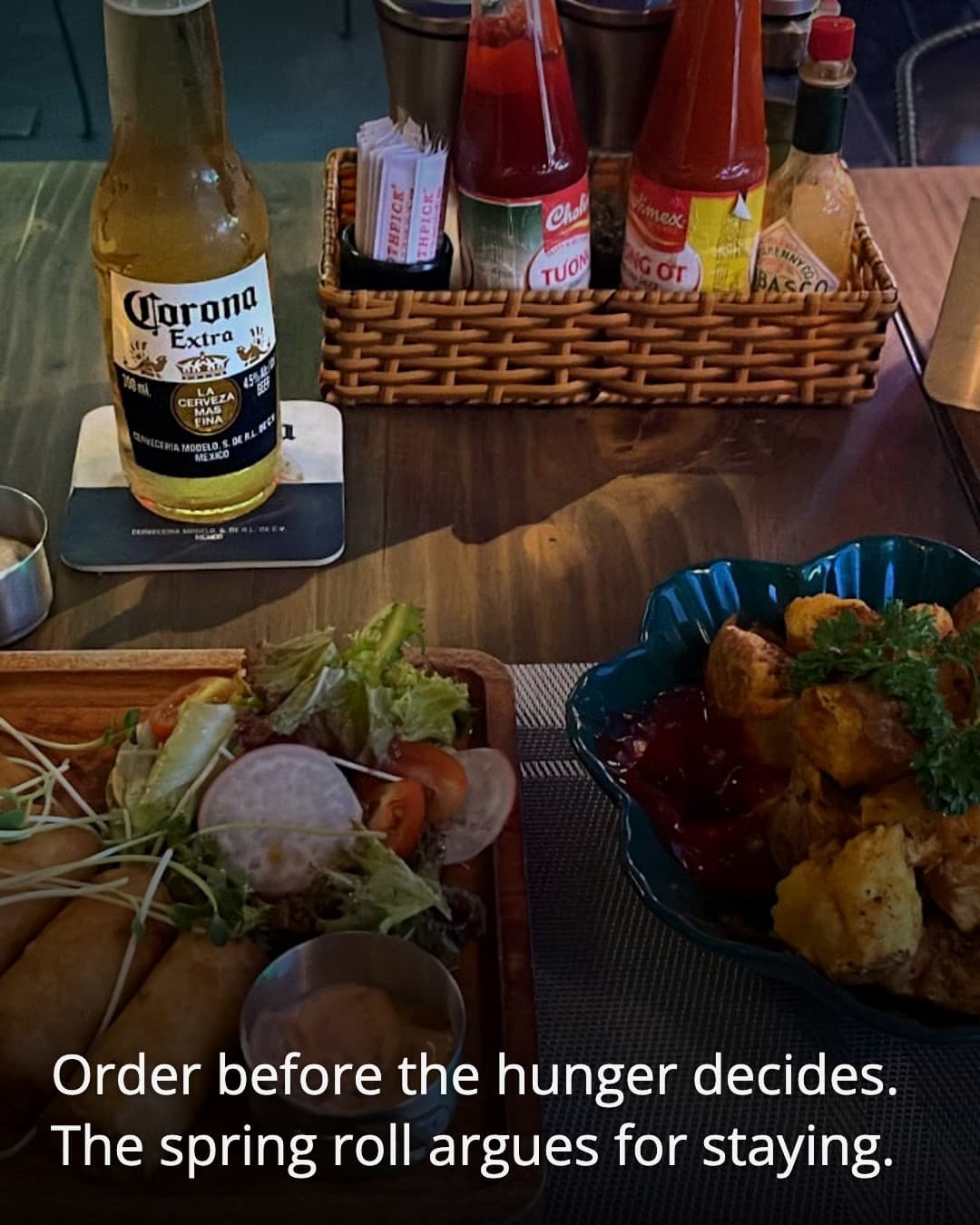 HIDEAWAY table with spring rolls and beer