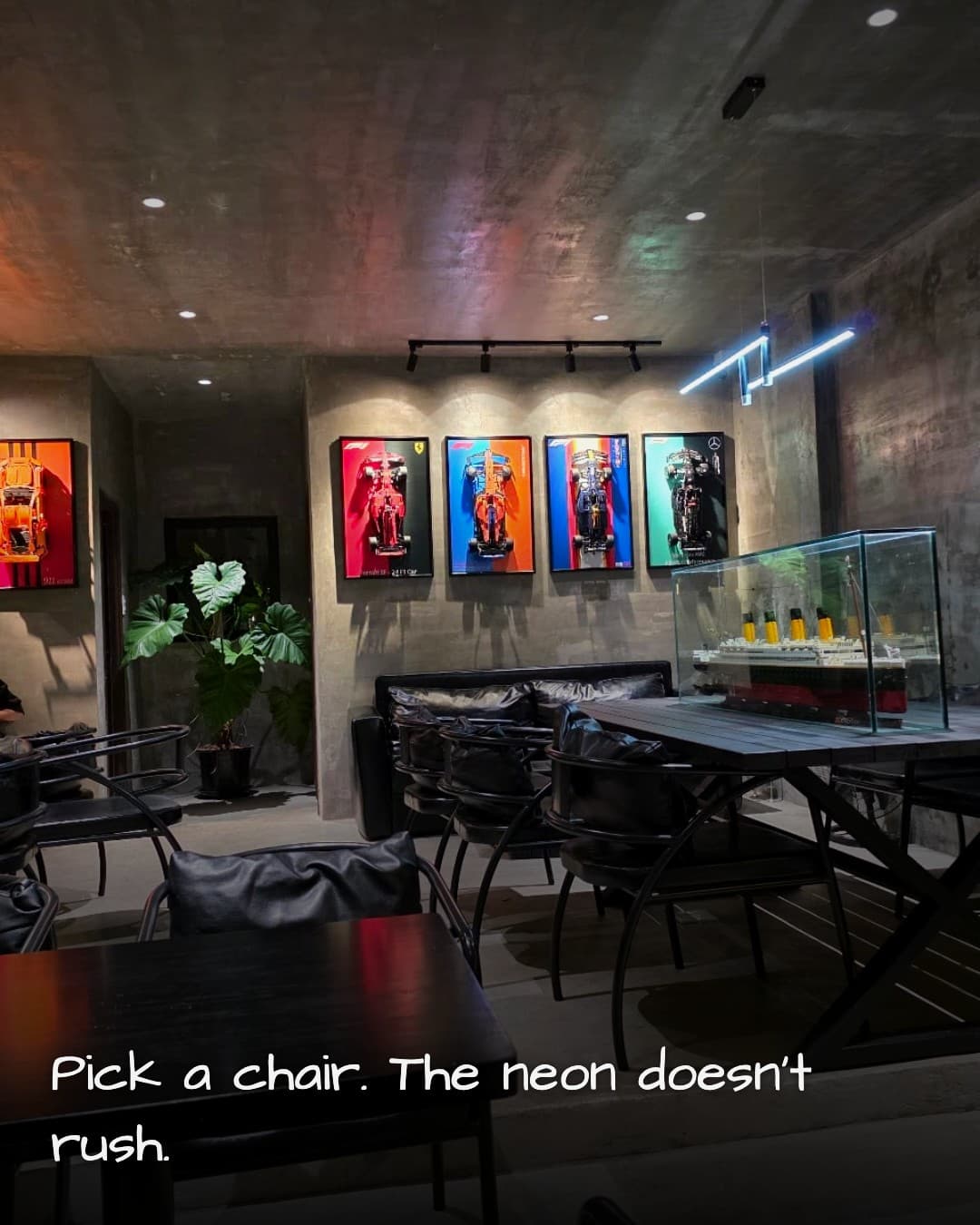 V COFFEE open floor with neon sculpture