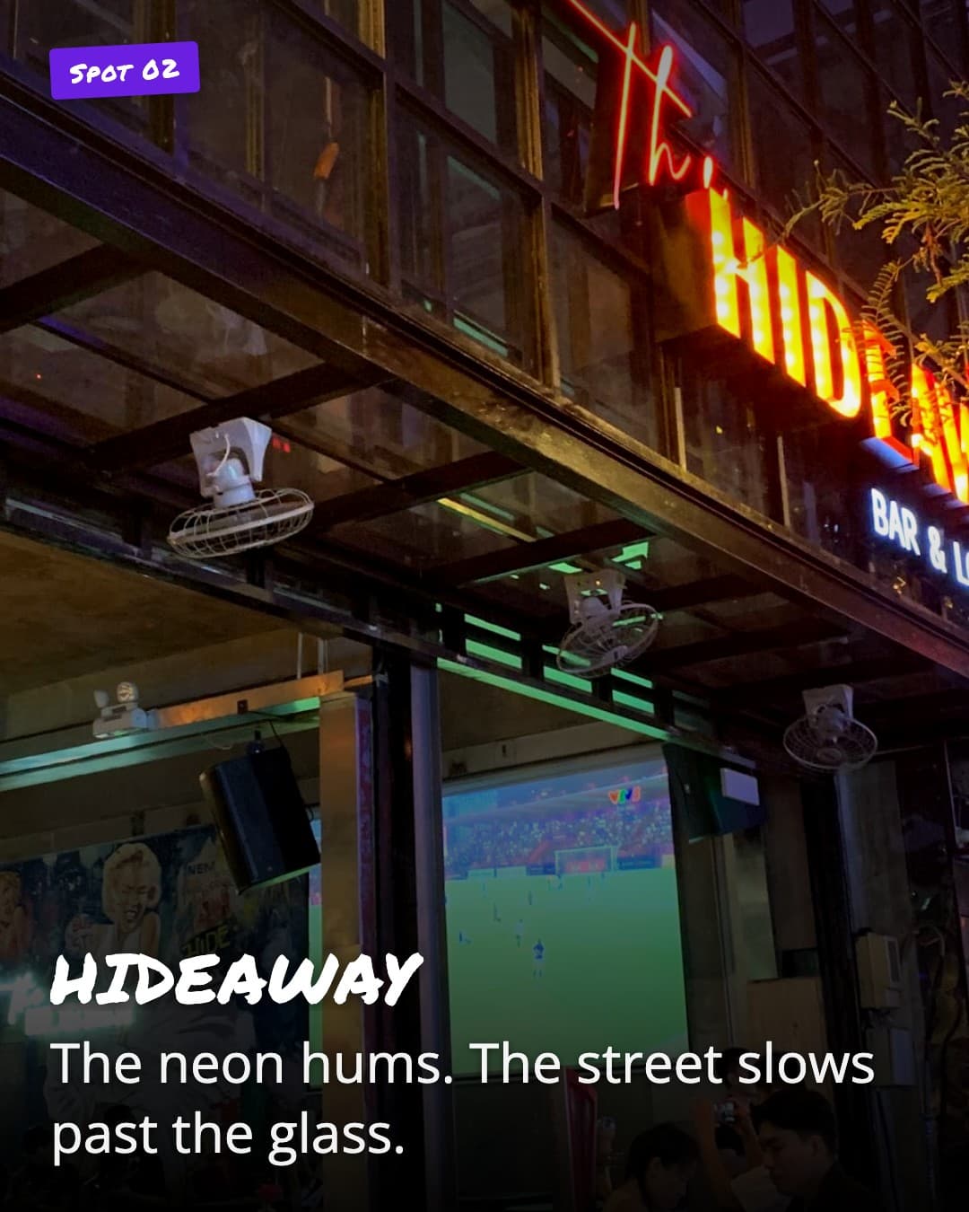 HIDEAWAY bar entrance with neon sign