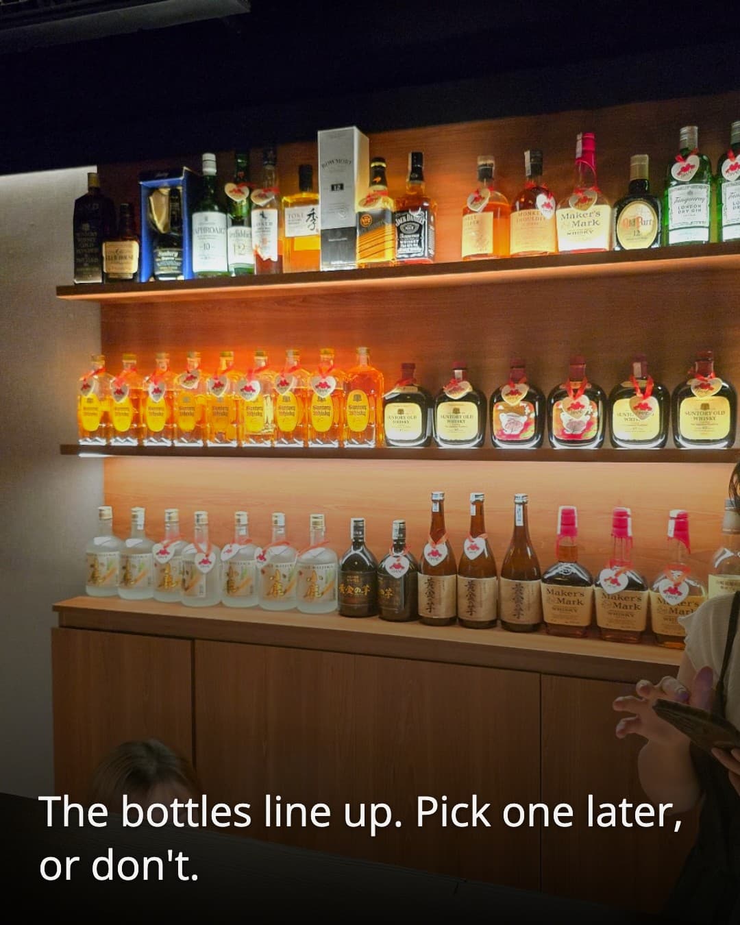 Raunji Maison Bar backlit bottle wall