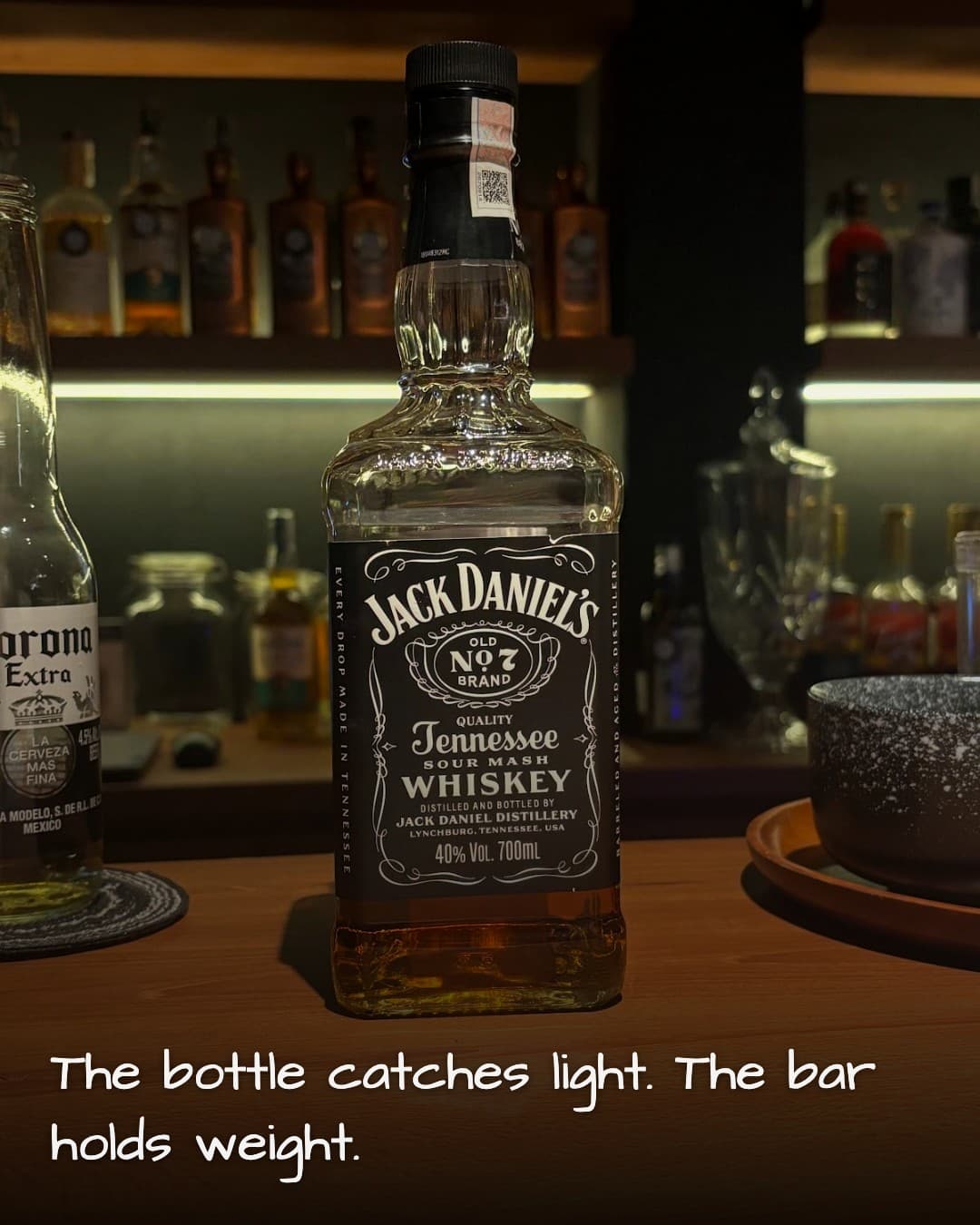 The Bar Hikasa Mixlogy whiskey bottle on counter