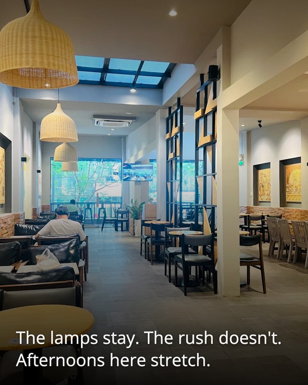 K Coffee Nguyen Thai Binh empty corridor with lamps