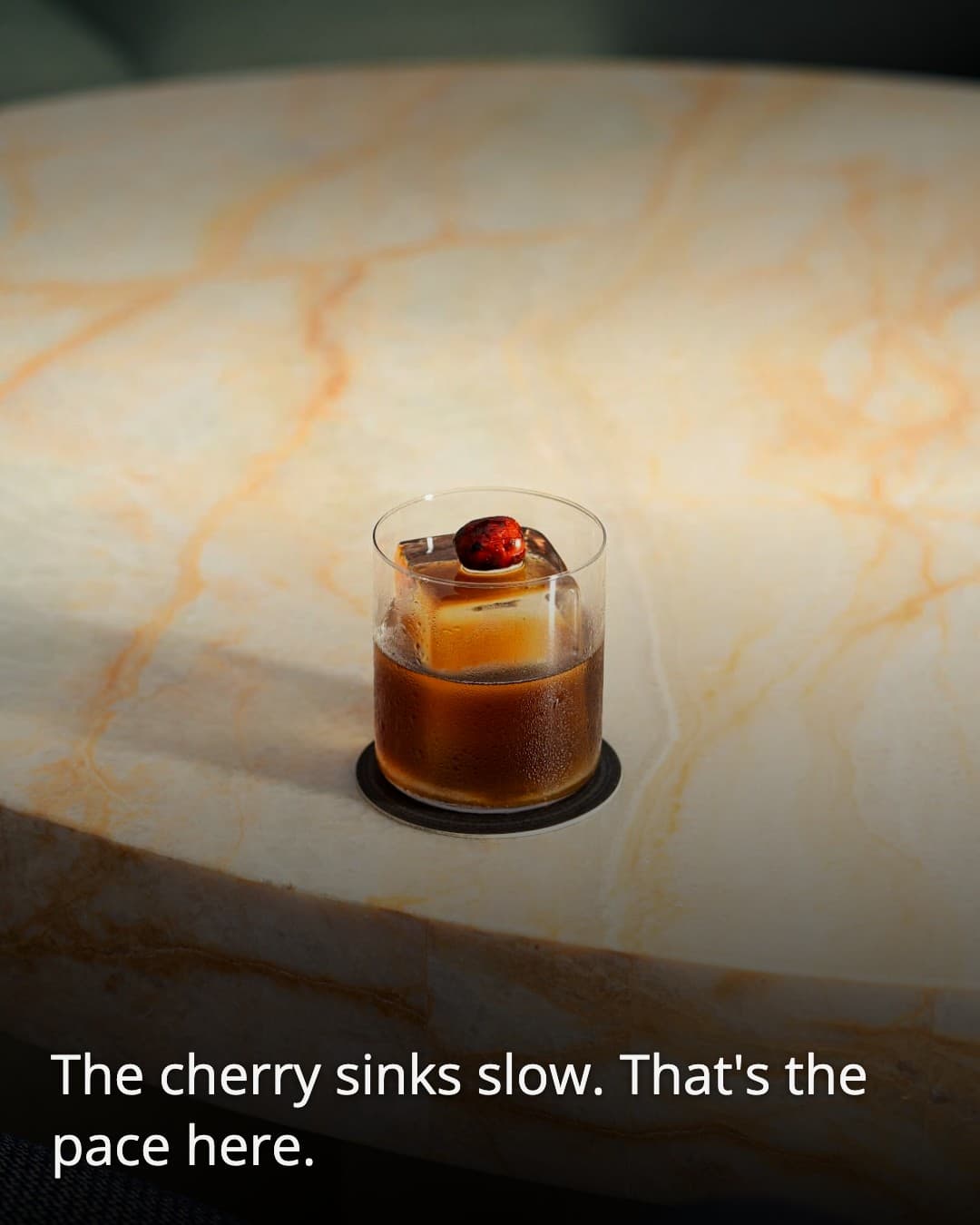 Afterglow Sky Bar cocktail with cherry