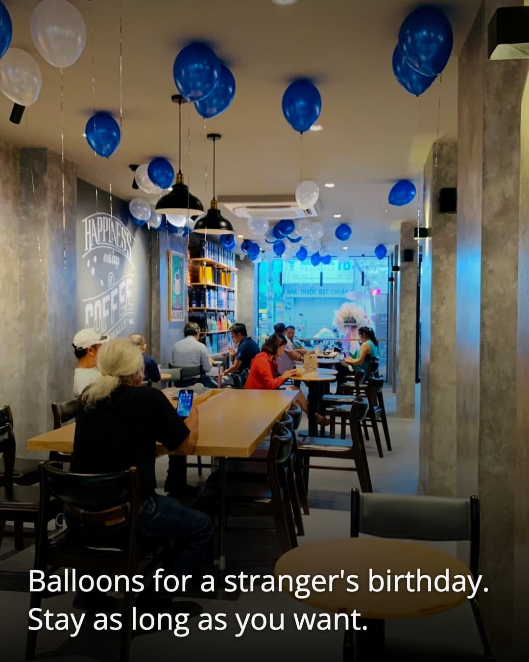 K Coffee Nguyen Thai Binh balloons overhead