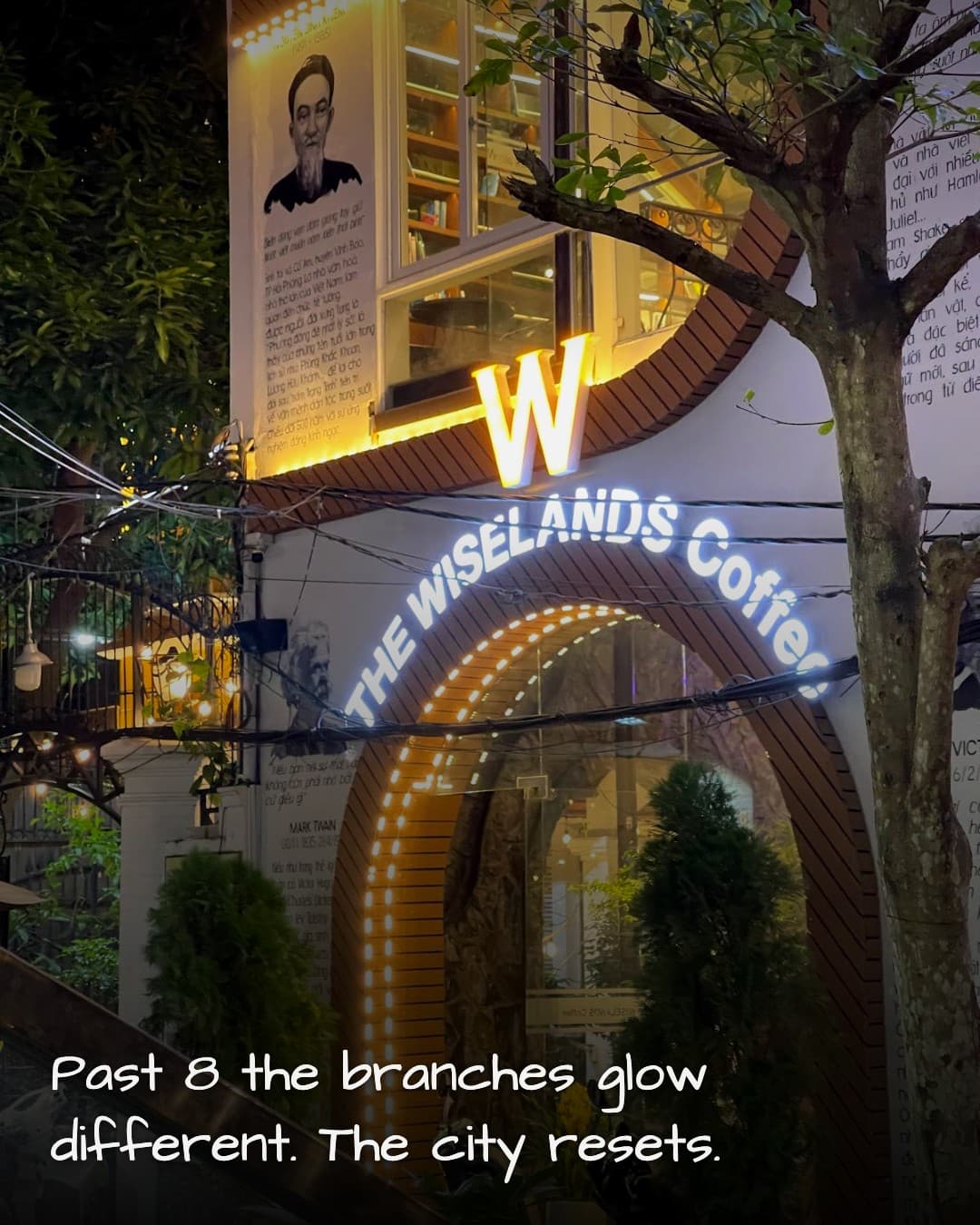 THE WISELANDS Coffee sign at night