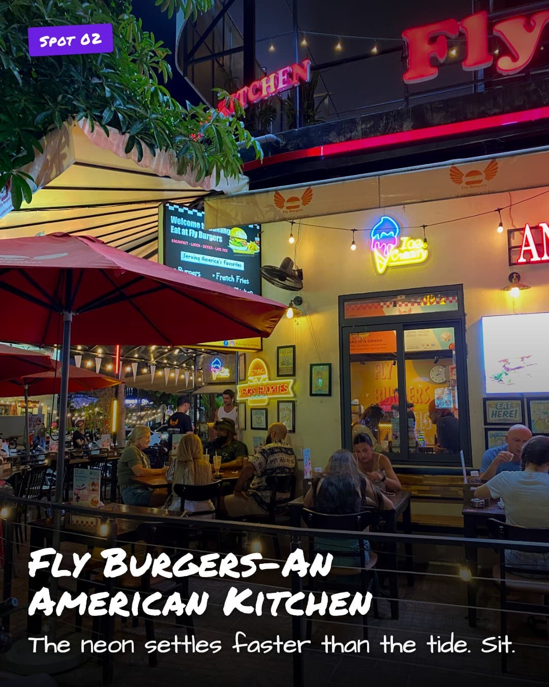 Fly Burgers exterior at dusk