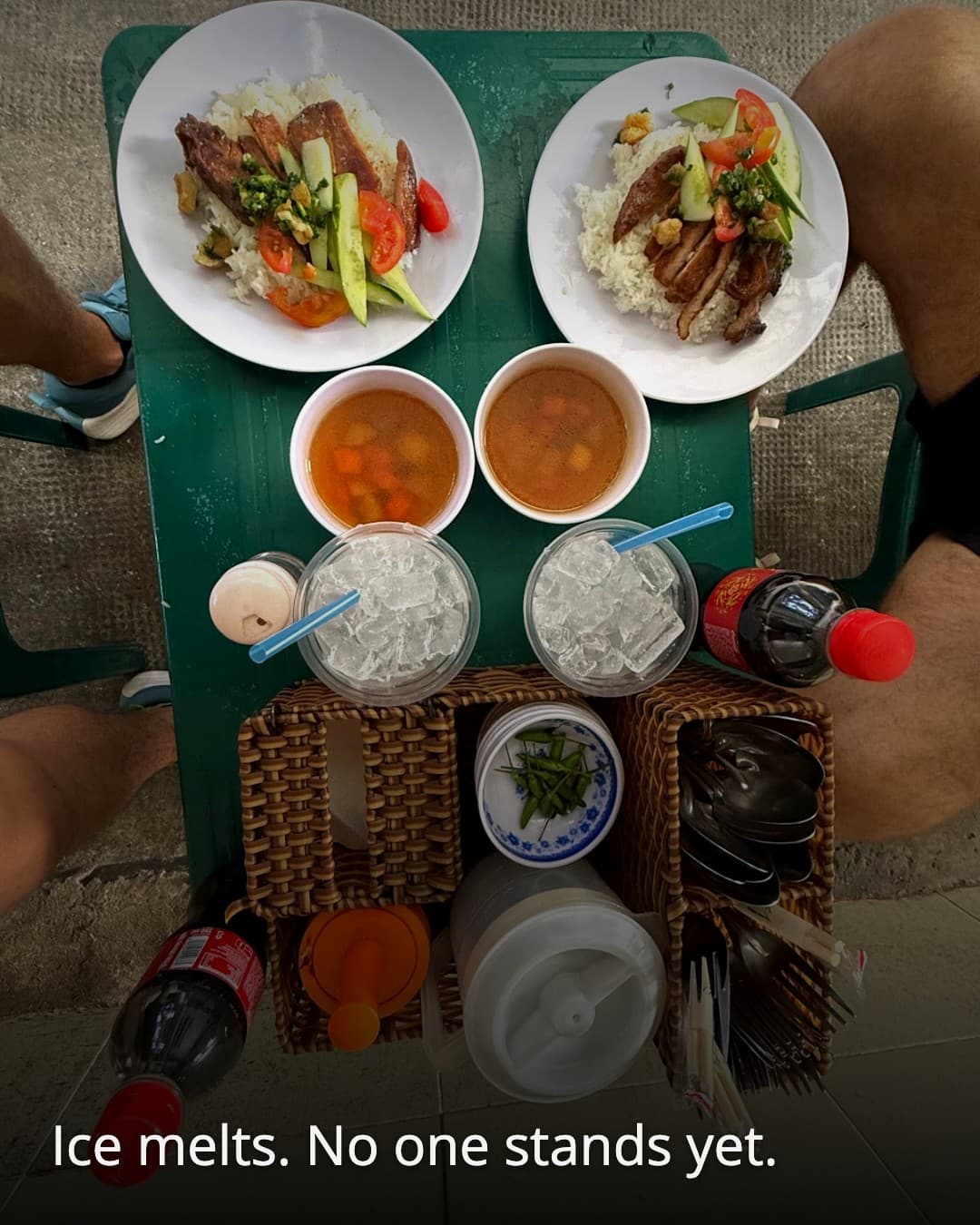 Com Tam 250 Tan Dinh sidewalk table