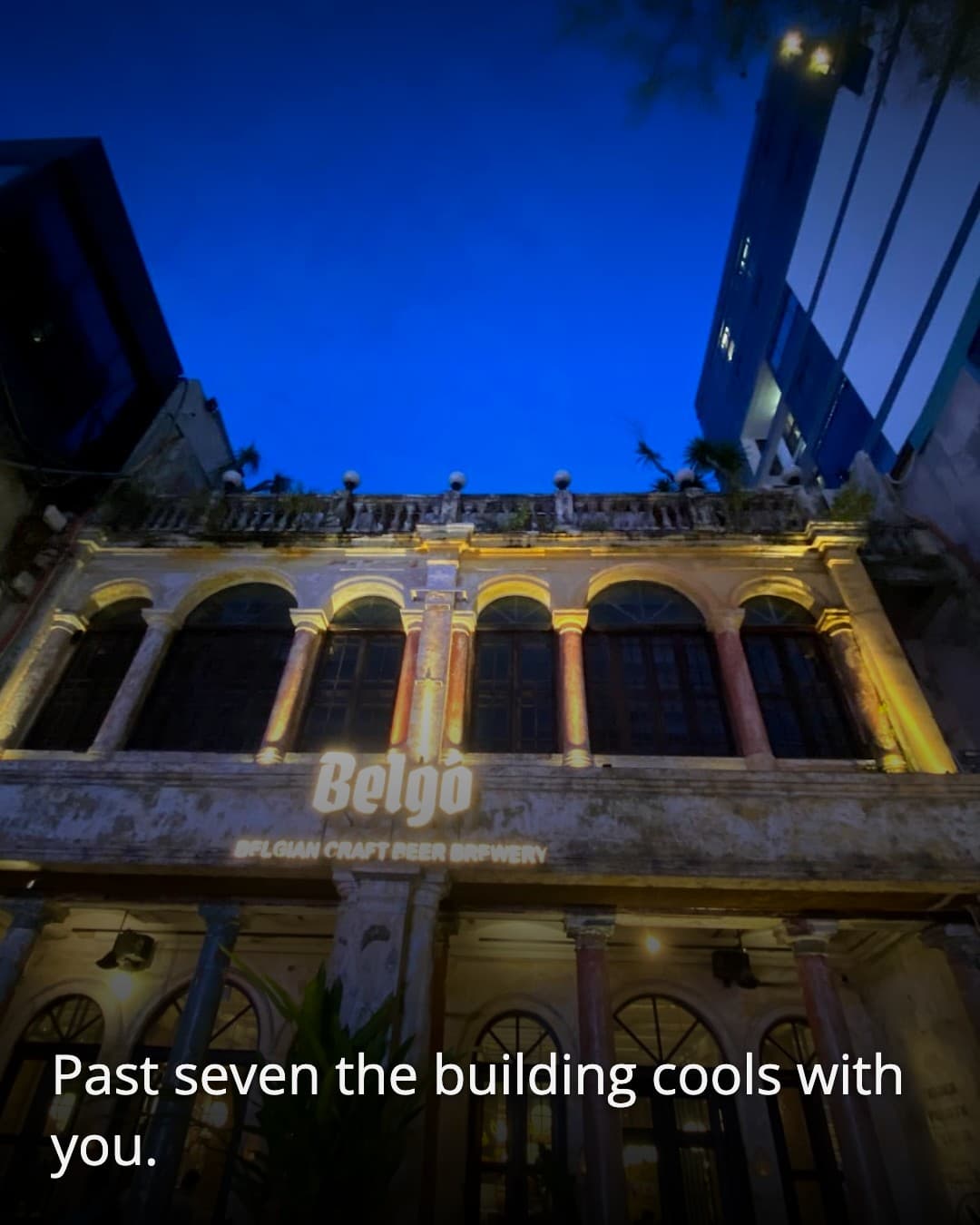 BELGO colonial facade at dusk